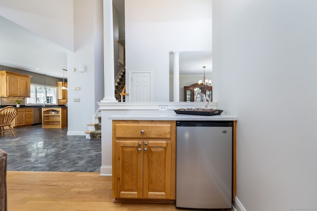 176 Fox Hollow Ln, Bristol, CT 06010 - bar featuring fridge, dishwasher, stairway, wood finished floors, and decorative light fixtures