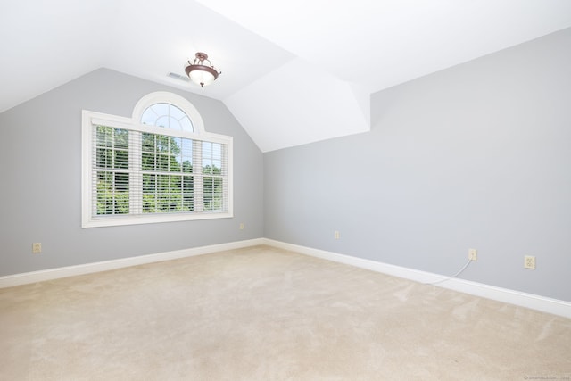 176 Fox Hollow Ln, Bristol, CT 06010 - bonus room featuring light colored carpet, lofted ceiling, and baseboards
