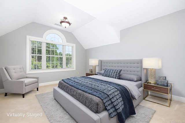 176 Fox Hollow Ln, Bristol, CT 06010 - bedroom with light colored carpet, vaulted ceiling, and baseboards