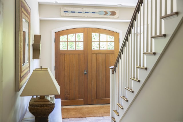 foyer featuring stairway