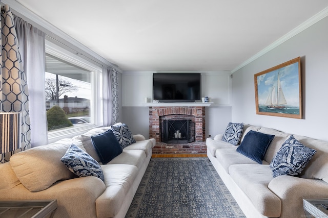 living room featuring ornamental molding, wood finished floors, and a brick fireplace