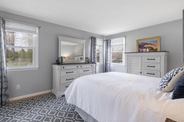 bedroom featuring baseboards