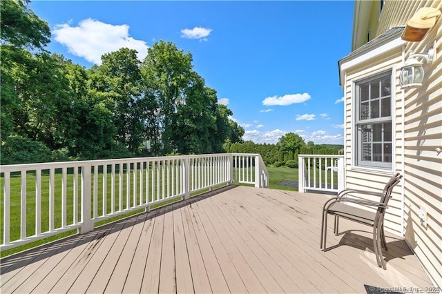 deck featuring a yard