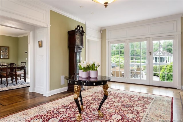 229 Umpawaug Rd, Redding, CT 06896 - entryway featuring crown molding, baseboards, and wood finished floors