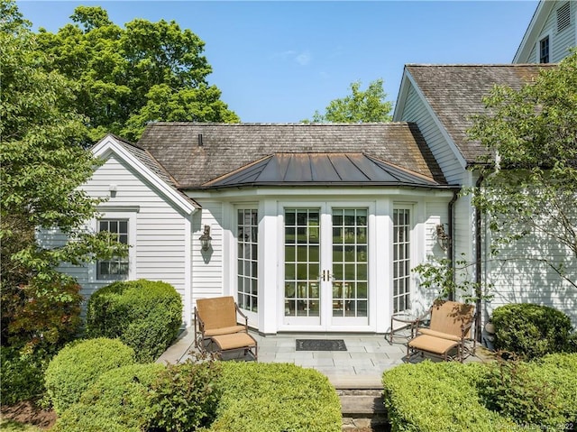 229 Umpawaug Rd, Redding, CT 06896 - rear view of property with a standing seam roof, french doors, metal roof, and a patio