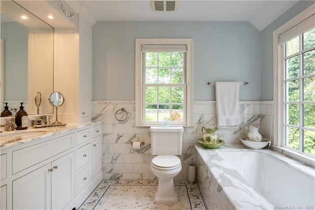 229 Umpawaug Rd, Redding, CT 06896 - full bath featuring vanity, a bath, toilet, tile walls, and wainscoting