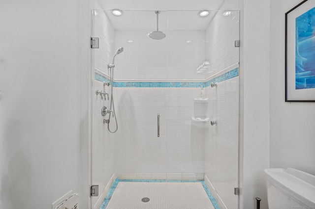 full bath featuring recessed lighting, a shower stall, and toilet