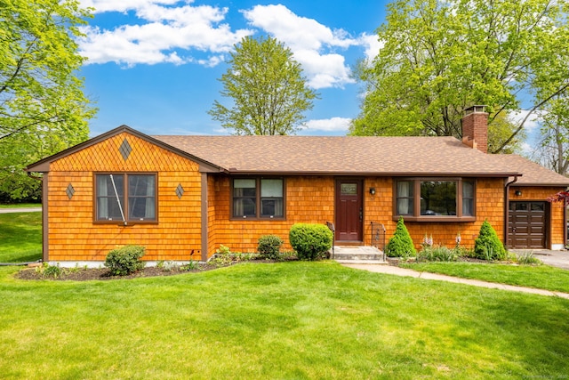 view of front of property featuring a chimney, roof with shingles, a front lawn, and a garage