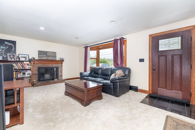 living room with a brick fireplace, baseboards, carpet flooring, and recessed lighting