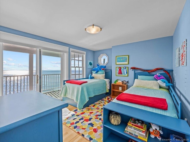 50 Grove Way, Clinton, CT 06413 - bedroom with light wood-type flooring and access to exterior