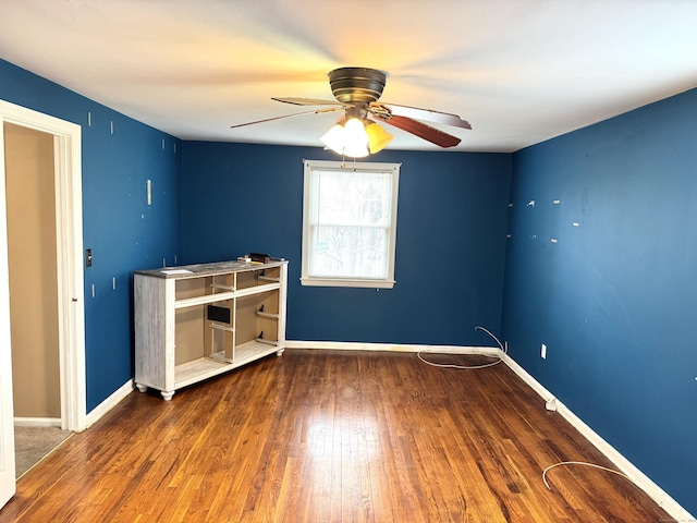 136 Oberlin Rd, Hamden, CT 06514 - unfurnished room with wood finished floors, a ceiling fan, and baseboards