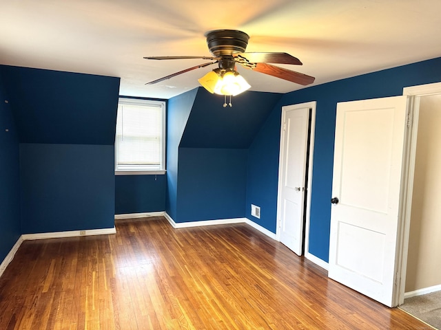 136 Oberlin Rd, Hamden, CT 06514 - additional living space with lofted ceiling, baseboards, wood finished floors, and ceiling fan