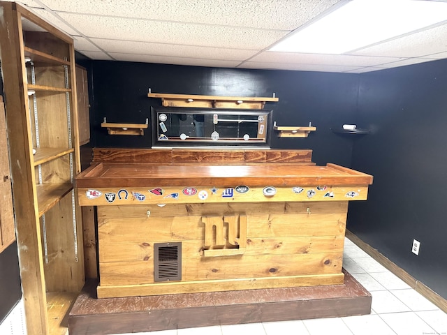 136 Oberlin Rd, Hamden, CT 06514 - bar with baseboards, a paneled ceiling, visible vents, and tile patterned floors