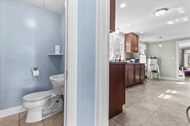 116 Gaylord Dr, Waterbury, CT 06708 - bathroom with recessed lighting, toilet, baseboards, and tile patterned floors