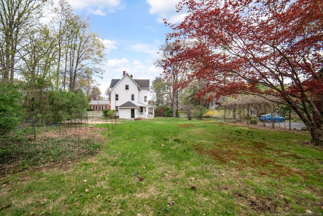 view of yard featuring fence