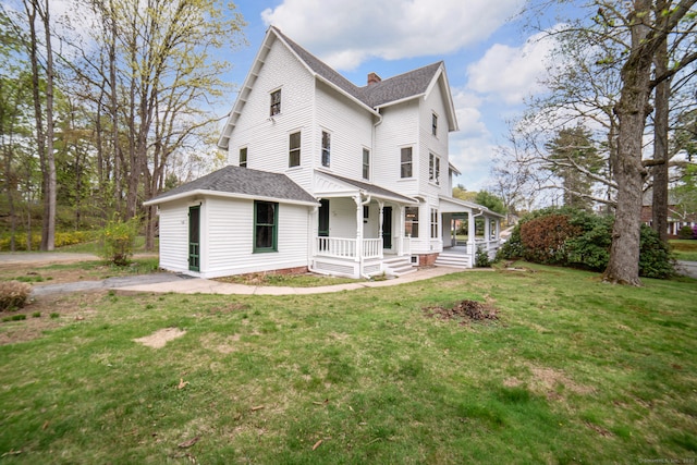 view of front of property featuring a porch, a front lawn, a shingled roof, and a chimney