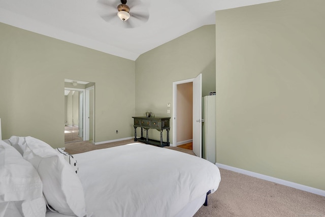 bedroom with high vaulted ceiling, ceiling fan, light carpet, and baseboards