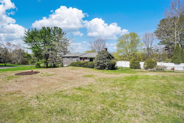 view of yard with fence