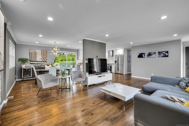 11 Botte Dr, West Haven, CT 06516 - living room featuring crown molding, recessed lighting, baseboards, dark wood-style flooring, and a chandelier