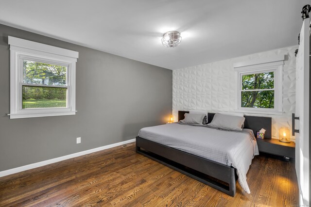 11 Botte Dr, West Haven, CT 06516 - bedroom with multiple windows, wood finished floors, and baseboards