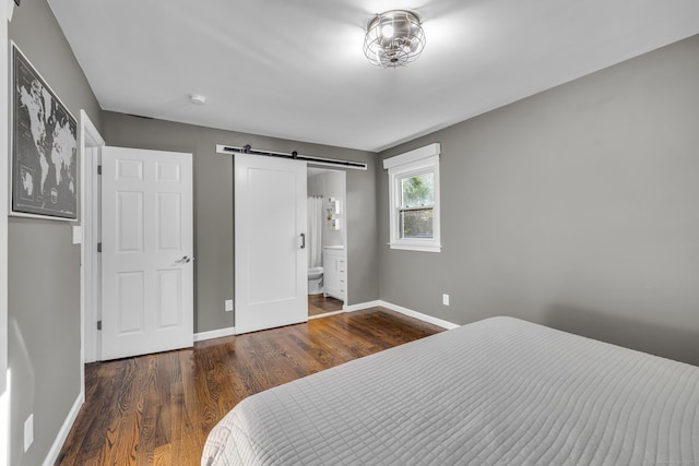 11 Botte Dr, West Haven, CT 06516 - bedroom with a barn door, baseboards, wood finished floors, and ensuite bathroom