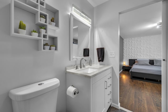 11 Botte Dr, West Haven, CT 06516 - bathroom featuring toilet, wood finished floors, and vanity