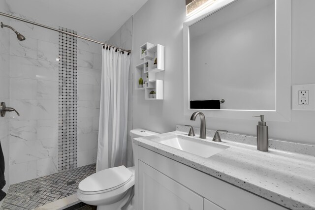 11 Botte Dr, West Haven, CT 06516 - bathroom featuring toilet, a stall shower, and vanity