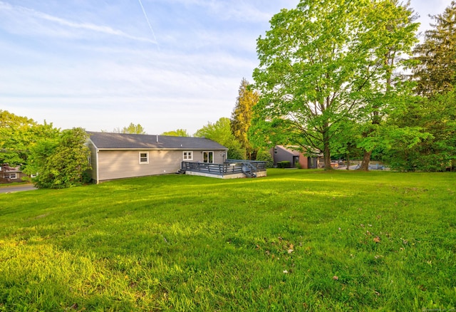 11 Botte Dr, West Haven, CT 06516 - view of green lawn featuring a deck