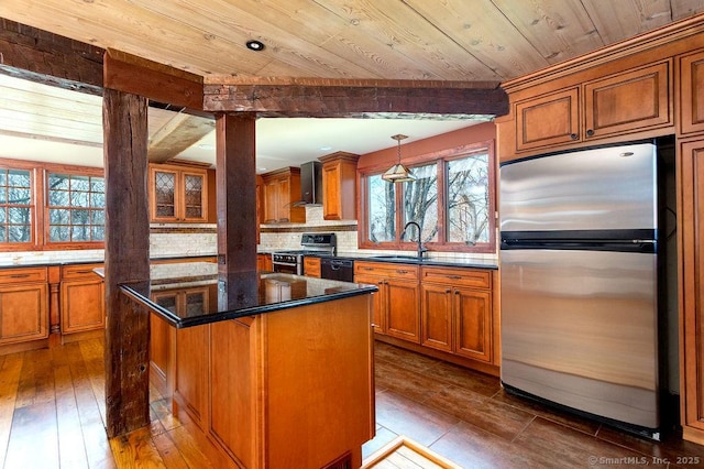 15 Fox Den Rd, Danbury, CT 06811 - kitchen with brown cabinets, stainless steel appliances, a sink, wall chimney exhaust hood, and decorative backsplash