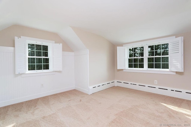 15 Fox Den Rd, Danbury, CT 06811 - bonus room with lofted ceiling, baseboards, and carpet