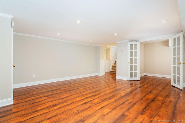 15 Fox Den Rd, Danbury, CT 06811 - unfurnished room featuring stairway, baseboards, crown molding, and wood finished floors