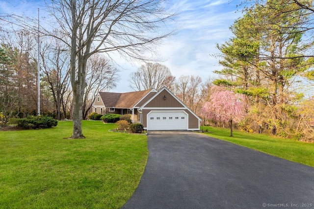15 Fox Den Rd, Danbury, CT 06811 - view of front of property featuring a front lawn, aphalt driveway, and a garage