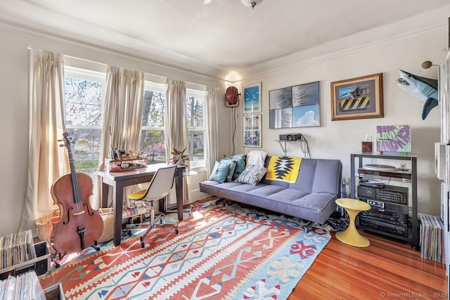 sitting room featuring wood finished floors