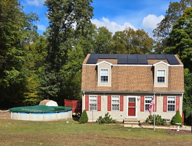 13 Damato Dr, Stonington, CT 06378 - exterior space with a covered pool, a front yard, and roof with shingles