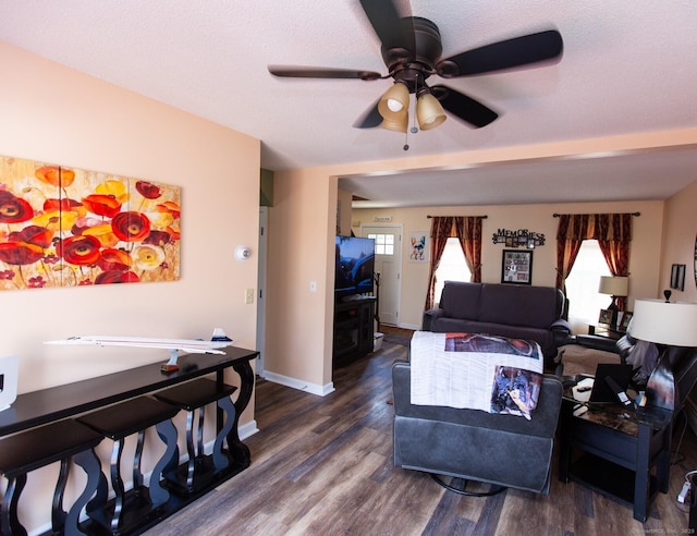 13 Damato Dr, Stonington, CT 06378 - living area with baseboards, ceiling fan, and dark wood-style flooring