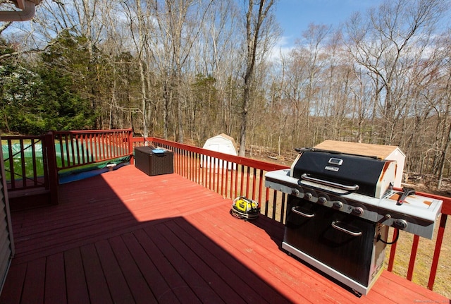 13 Damato Dr, Stonington, CT 06378 - deck featuring a grill, an outdoor structure, and a storage shed
