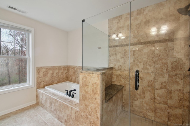 96 Damascus Rd, Branford, CT 06405 - bathroom with visible vents, a garden tub, a wealth of natural light, and a stall shower