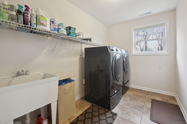 96 Damascus Rd, Branford, CT 06405 - laundry room with a sink, washing machine and dryer, baseboards, visible vents, and laundry area
