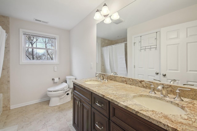 96 Damascus Rd, Branford, CT 06405 - full bath featuring baseboards, a sink, double vanity, and toilet
