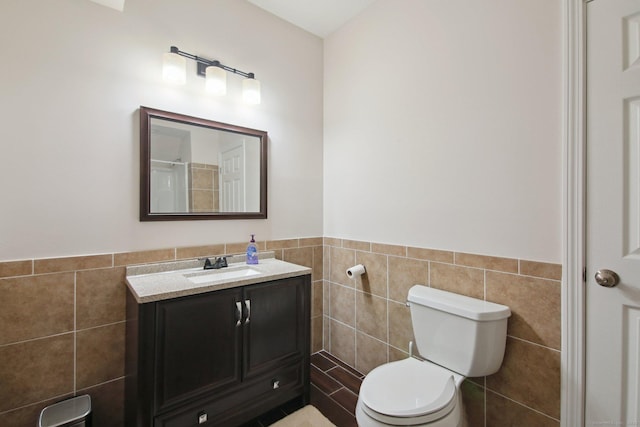 96 Damascus Rd, Branford, CT 06405 - full bathroom featuring wainscoting, toilet, vanity, and tile walls