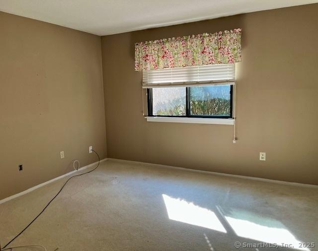 9 Heritage Cir Unit D, Southbury, CT 06488 - unfurnished room featuring carpet flooring and baseboards