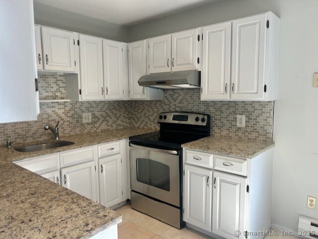 9 Heritage Cir Unit D, Southbury, CT 06488 - kitchen featuring electric range, under cabinet range hood, a sink, white cabinetry, and light stone countertops