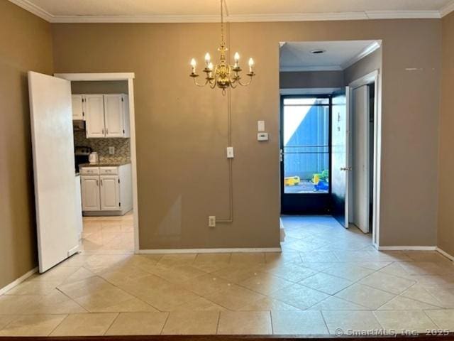 9 Heritage Cir Unit D, Southbury, CT 06488 - unfurnished dining area featuring a chandelier, baseboards, and crown molding