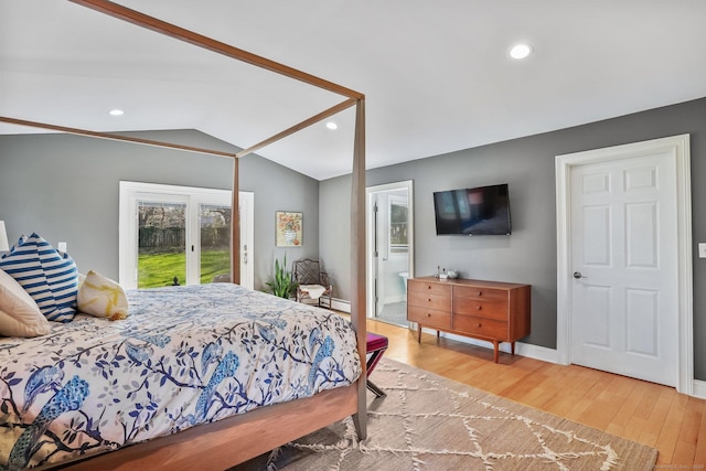bedroom featuring recessed lighting, wood finished floors, access to outside, vaulted ceiling, and baseboards