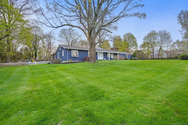 view of yard featuring fence