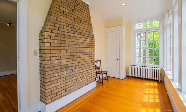 187 W Park Ave, New Haven, CT 06511 - interior space with crown molding, baseboards, radiator, recessed lighting, and wood finished floors