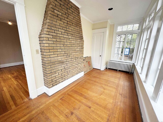 187 W Park Ave, New Haven, CT 06511 - unfurnished sunroom featuring radiator