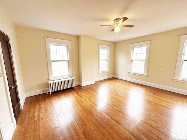 187 W Park Ave, New Haven, CT 06511 - spare room featuring ceiling fan, hardwood / wood-style floors, baseboards, and radiator