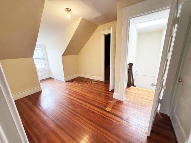187 W Park Ave, New Haven, CT 06511 - bonus room with baseboards, wood-type flooring, and vaulted ceiling