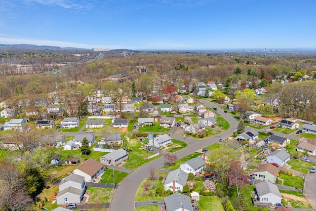 birds eye view of property with a residential view